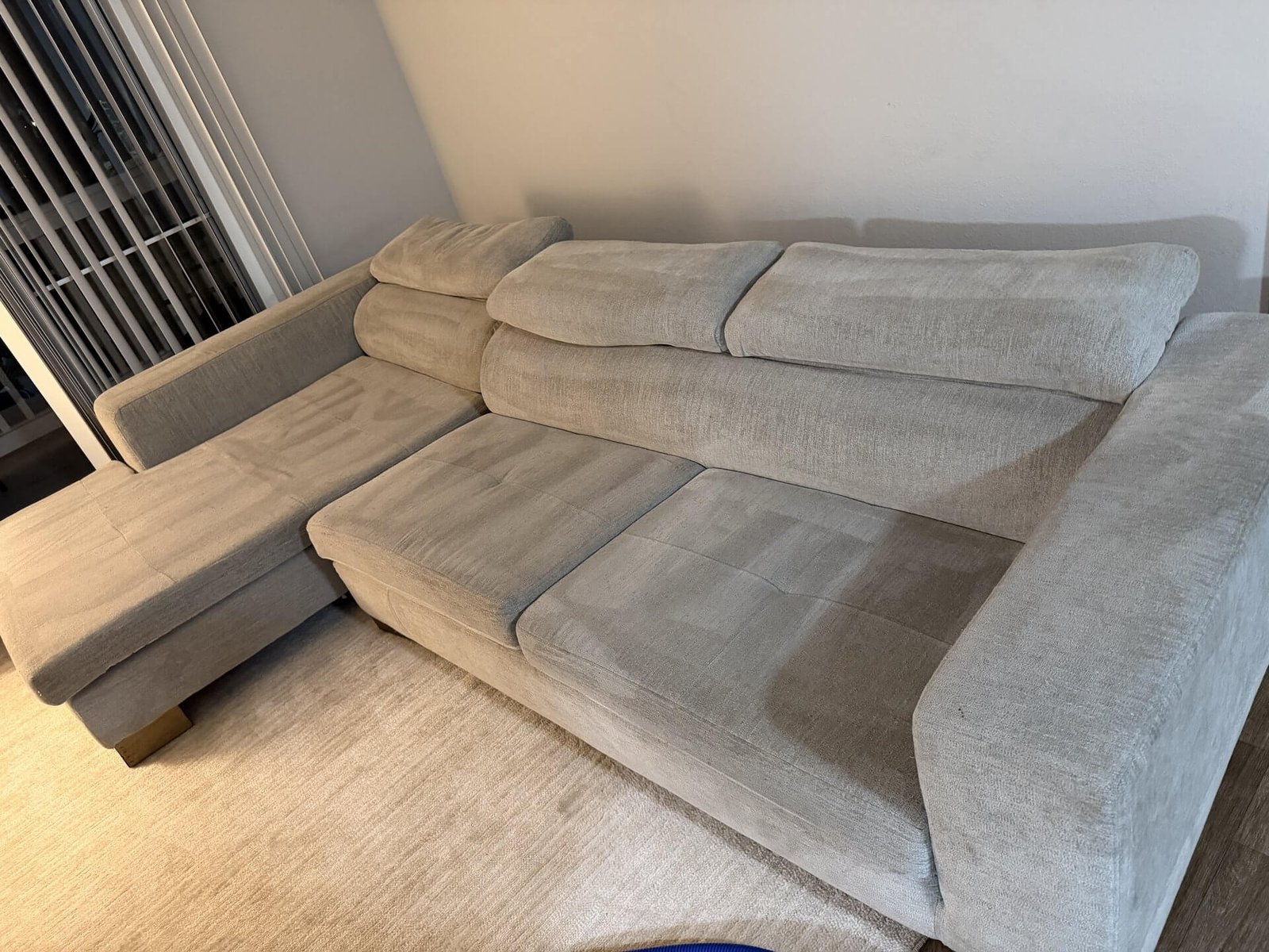 Sectional sofa being steam cleaned in a Marietta, GA home